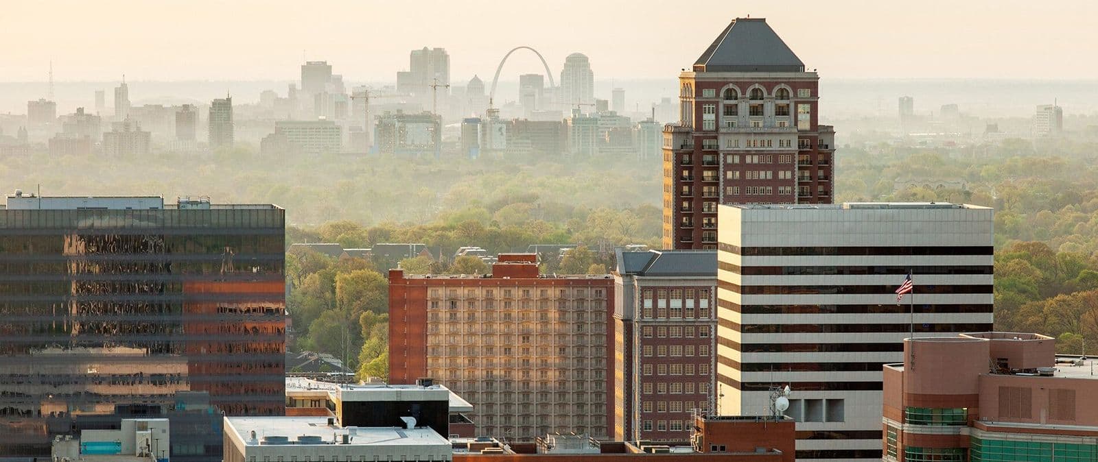 Clayton skyline with the Gateway Arch in the distance