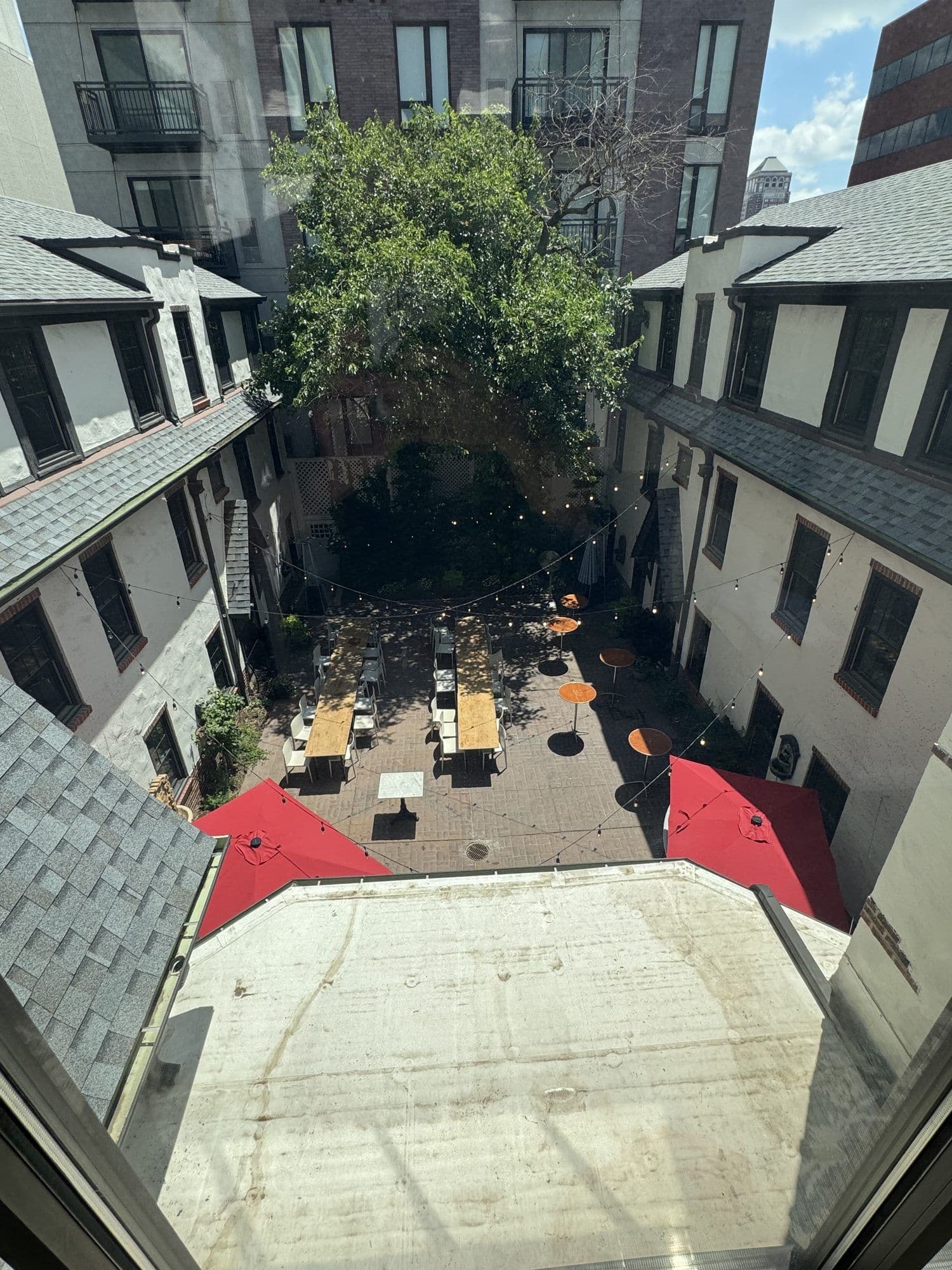 The courtyard from above, framed by the inn