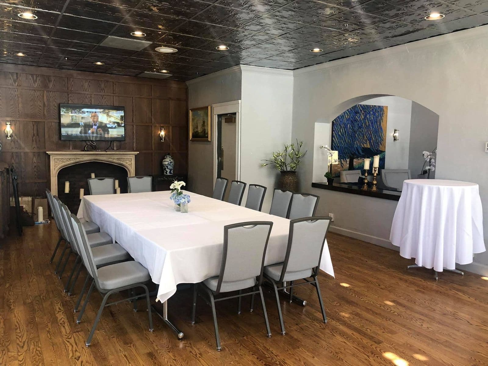 A long meeting table in the Gables Room
