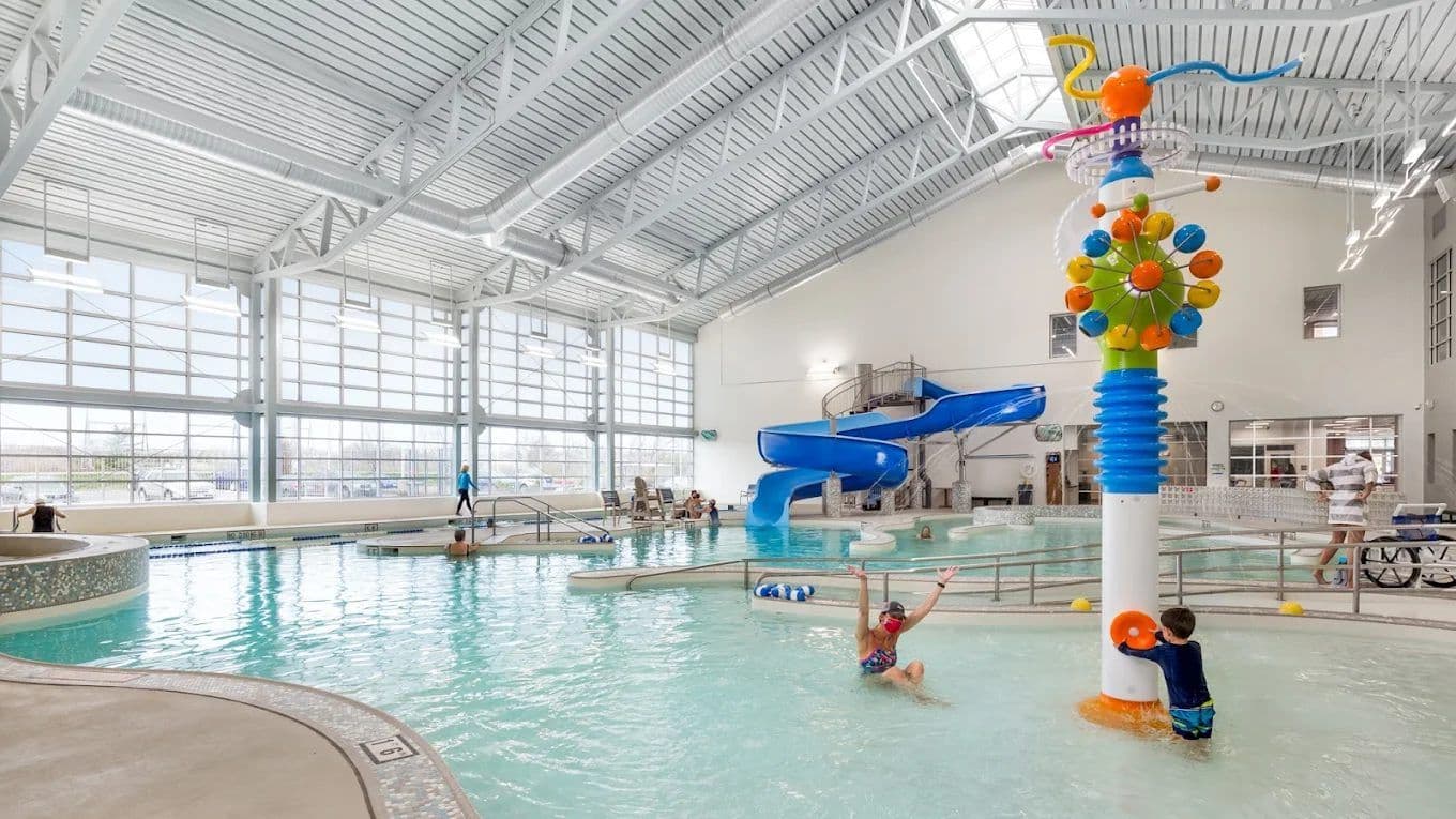 The pool, slide and lazy river at the Center of Clayton