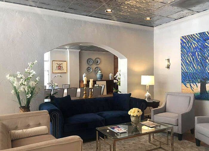 Lobby seating with flowers and blue and white china