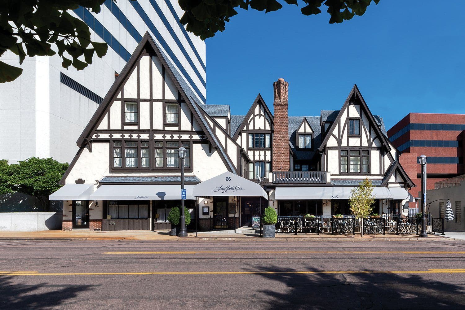 The Tudor gables of Seven Gables Inn against the Clayton skyline
