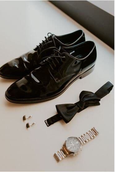 Groom shoes, bow tie and watch